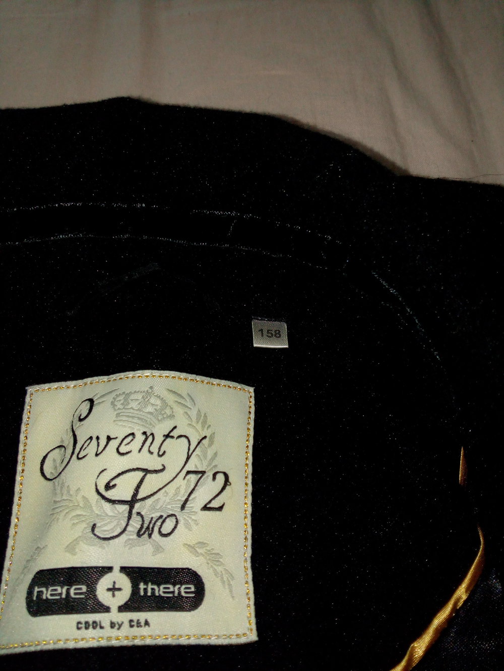 schicker schwarzer Mantel