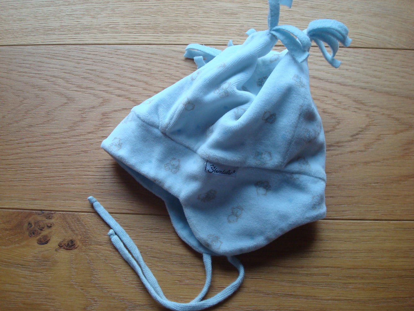 warme Mütze mit Ohrenklappen und Zipfel von Sterntaler