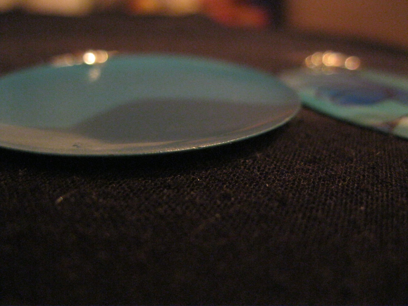 petrolfarbene Ohrringe mit Blumenmuster