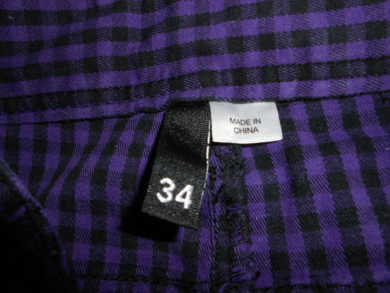 Röhre Jeans 34 H&M schwarz lila kariert