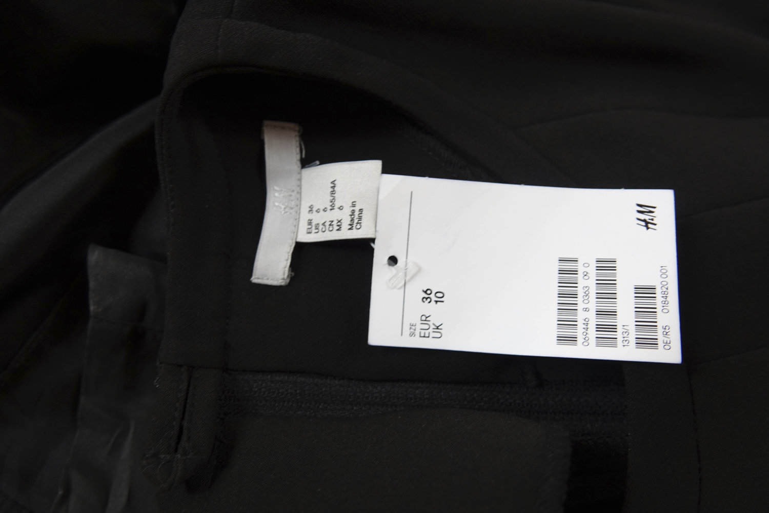 Schwarzes Kleid mit Faltenwurf NEU mit Etikett