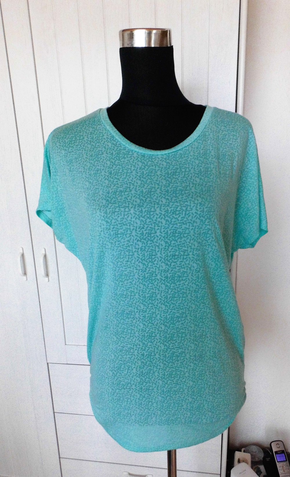 Türkisenes Sportshirt