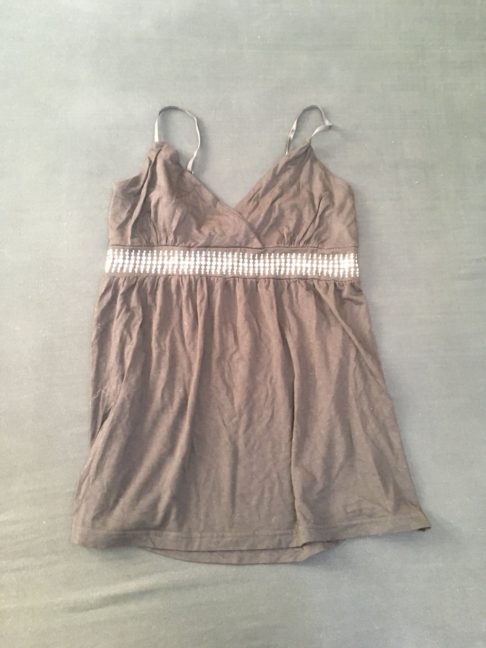 Schwarzes Damentop mit glitzersteinen