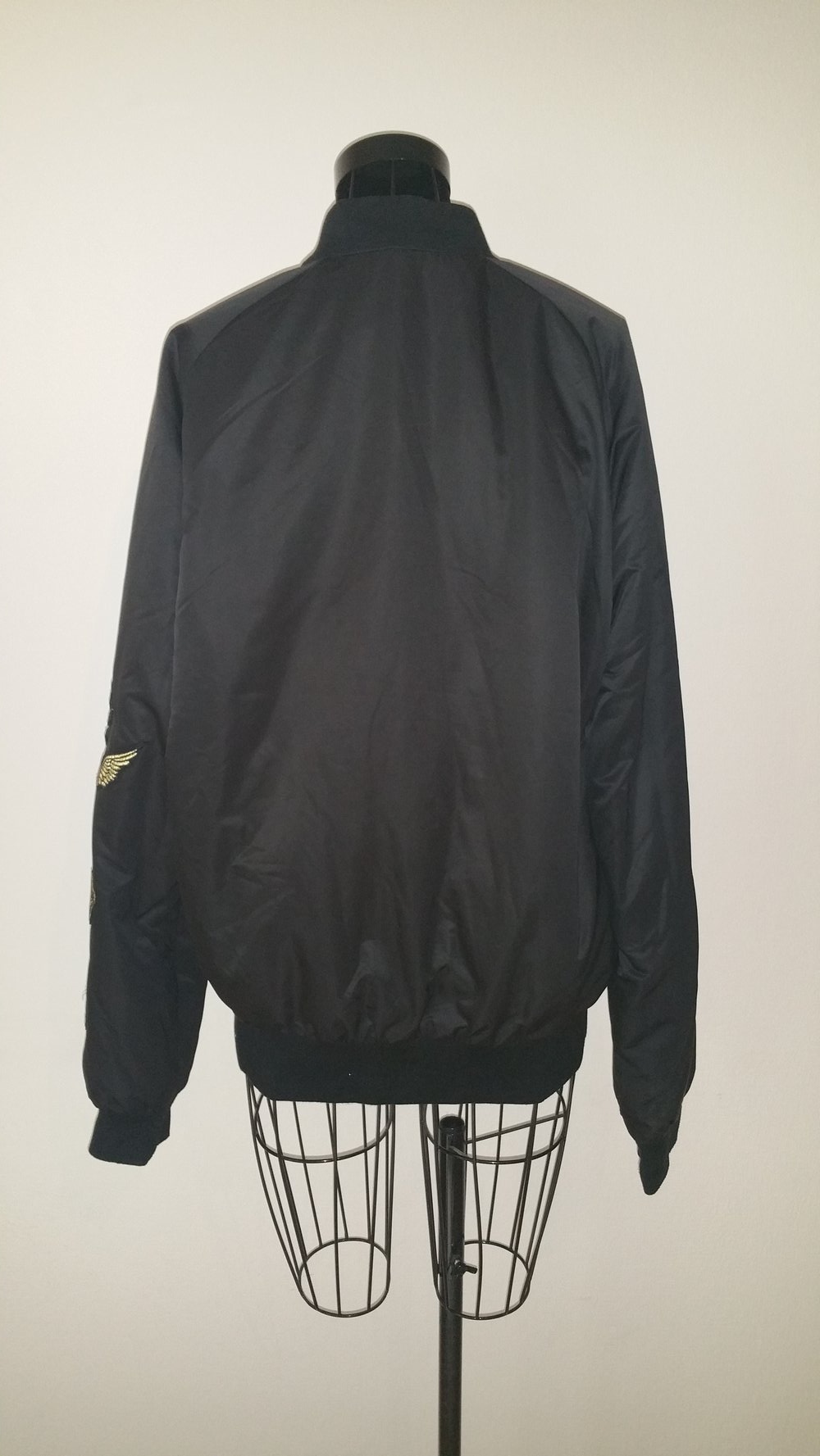 Puma Vashtie Bomberjacke, schwarz/gold