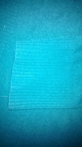 Türkiser Strickpulli