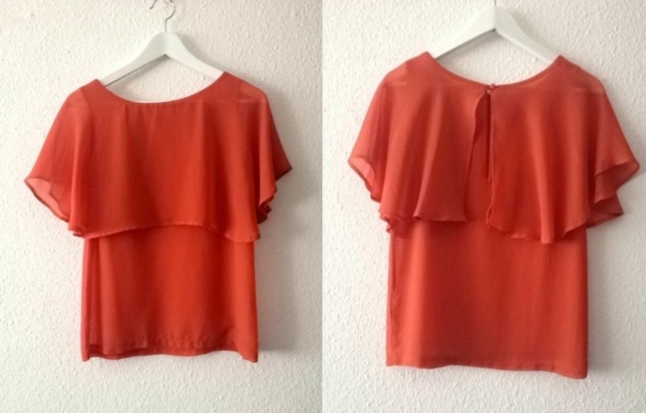 Orangene Bluse mit Fledermausärmeln