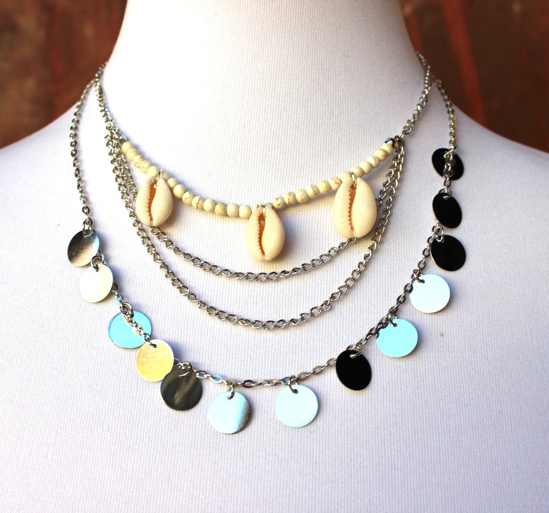 mehrreihige filigrane Statementkette in silber u. mit Muscheln