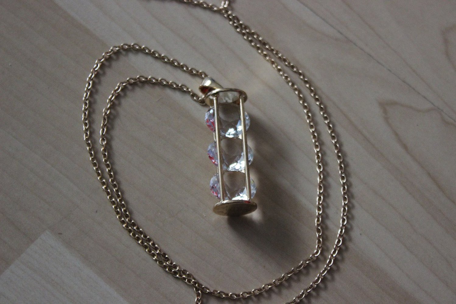 kette mit anhänger gold sanduhr