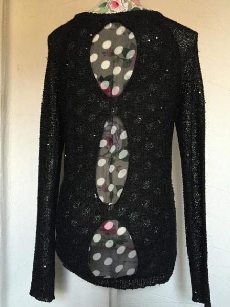 Schwarzer Pullover mit Pailletten 