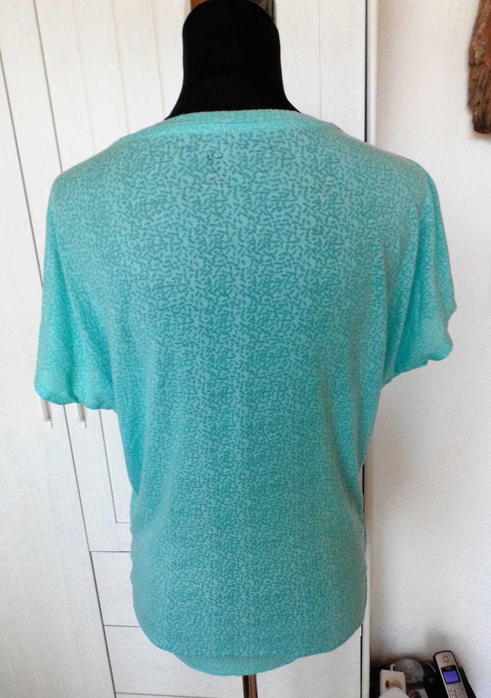 Türkisenes Sportshirt