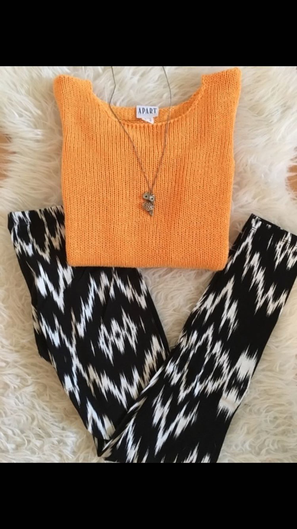 Gemütlicher oranger Pullover