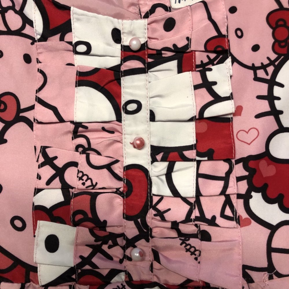 Kleid Hello Kitty chic glänzend Gr.128 H&M