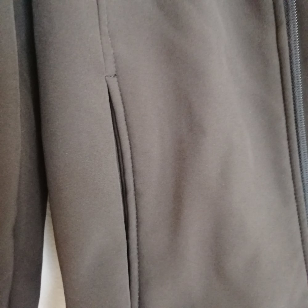 Softshell Jacke mit Innenfutter orange Reißverschluss Taschen Kapuze