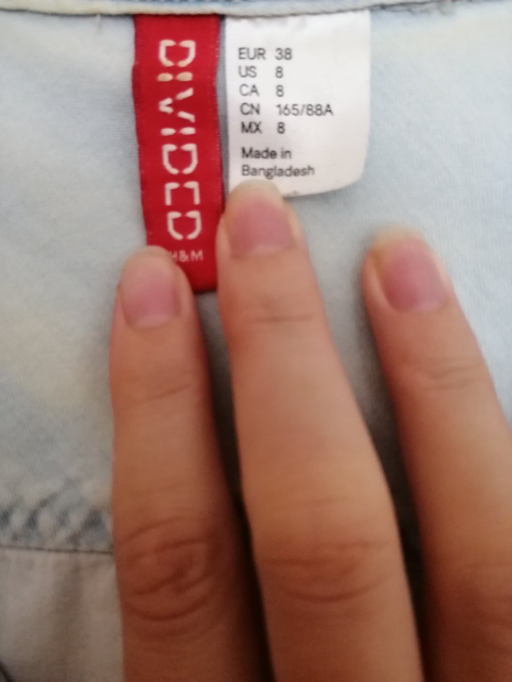 Blaue Jeansbluse von H & M mit Knöpfen