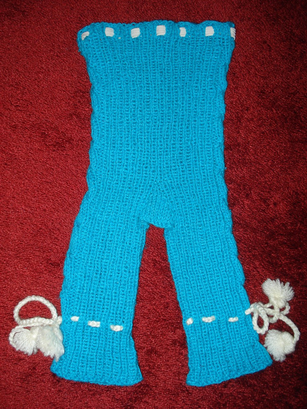 türkisblaue Strickhose