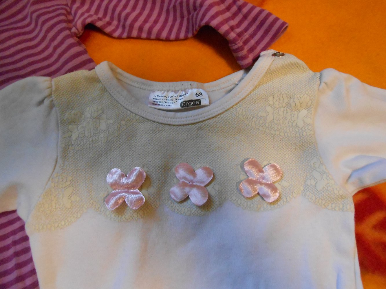 2 Bodys 68 H&M ergee lila weiß