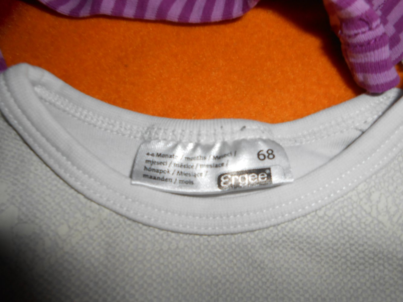 2 Bodys 68 H&M ergee lila weiß