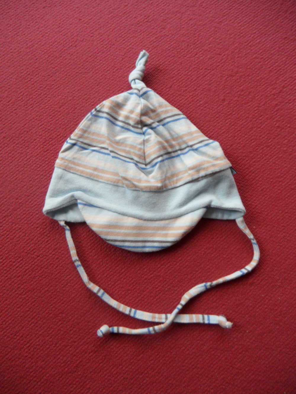 obersüße Mütze mit Bommel Knoten Sterntaler KU 39