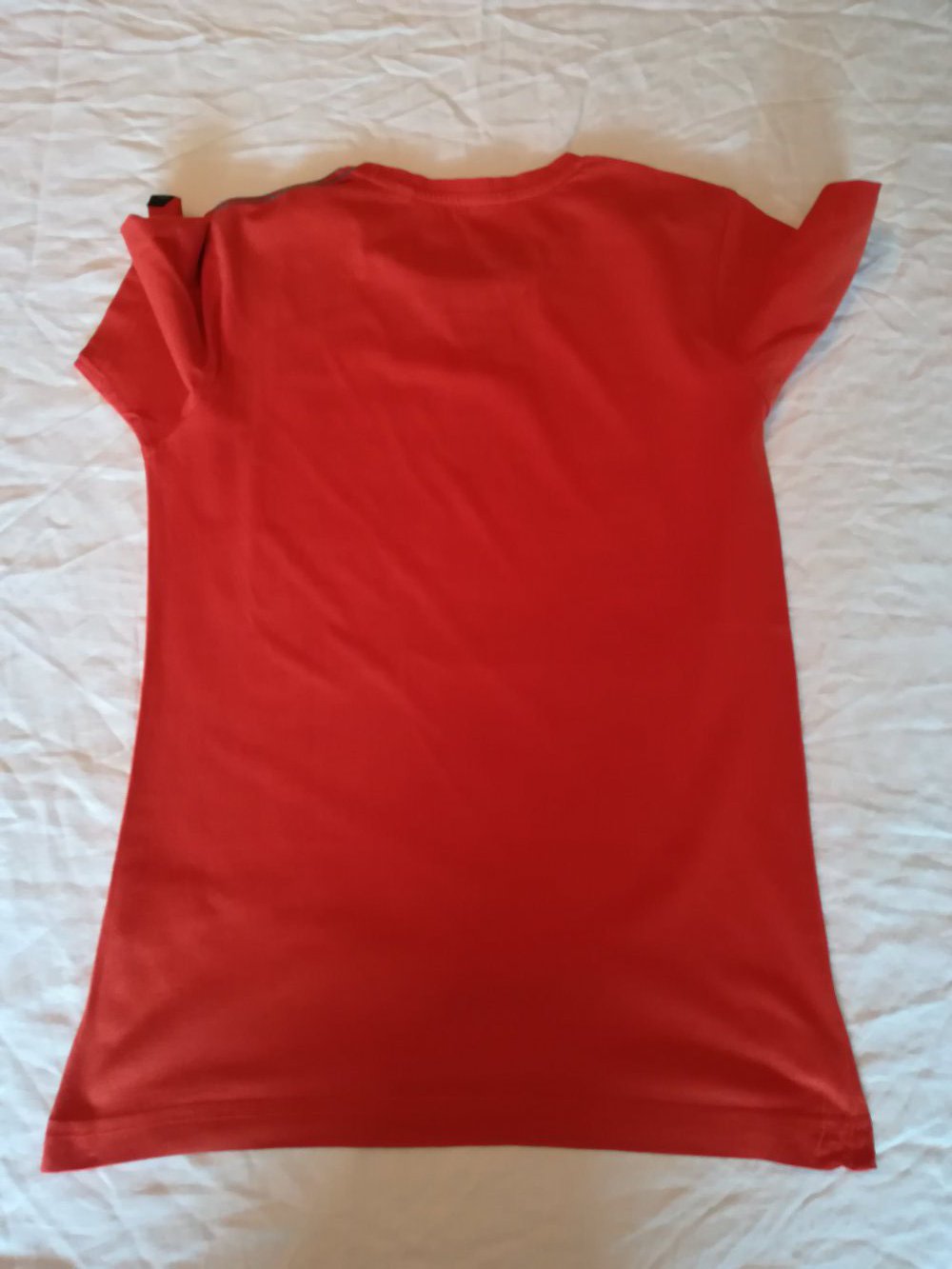 Orangefarbenes T-Shirt mit coolem Druck von C&A 