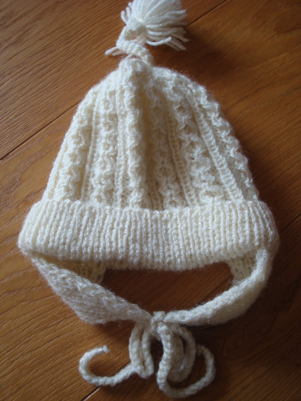 Mütze mit Ohrenklappen, Strickmütze handmade