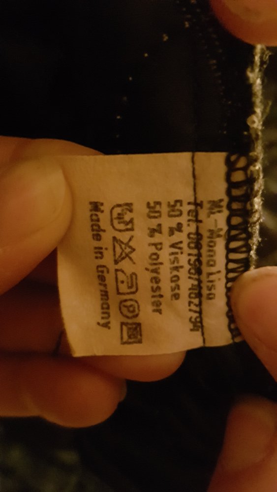 Gefütterte Schwarze Herbst/Winter Jacke mit Blättern