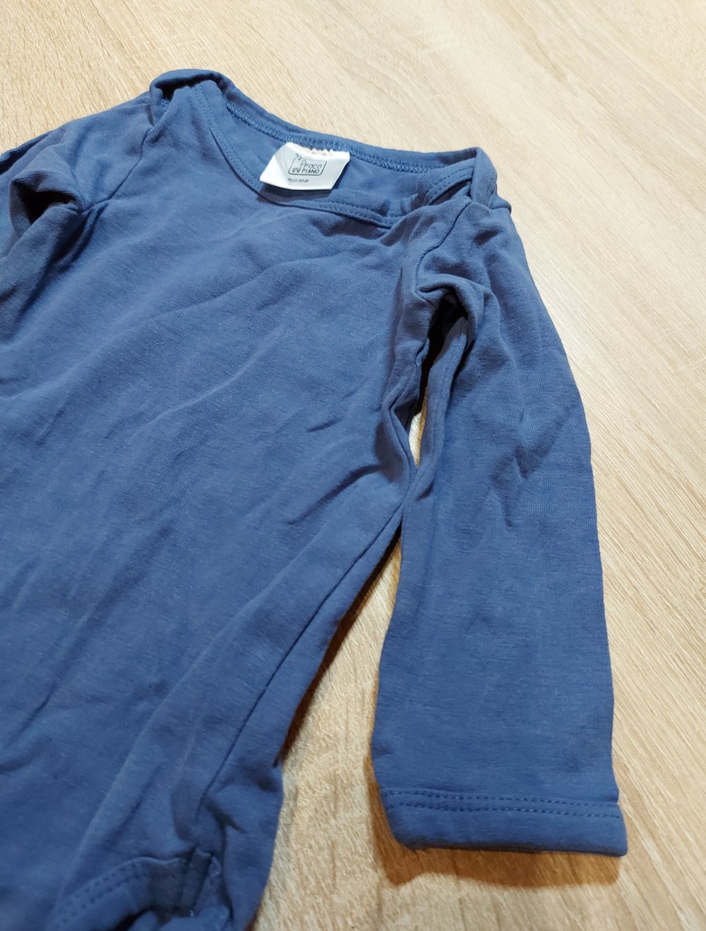 dunkelblauer Langarmbody Größe 62/68