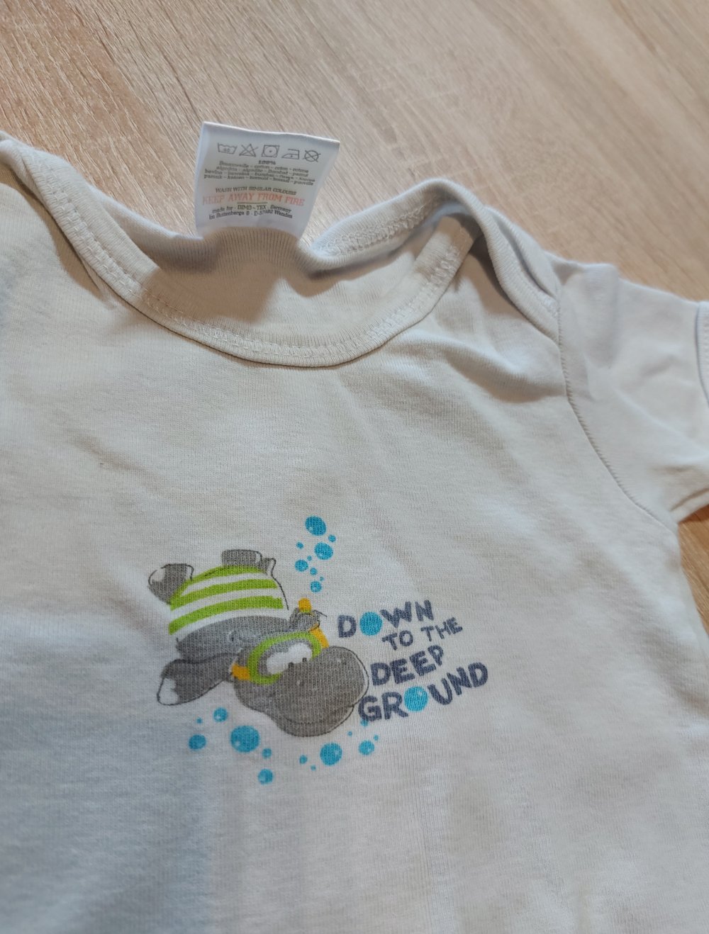 Kurzarmbody Dimotex Größe 86/92