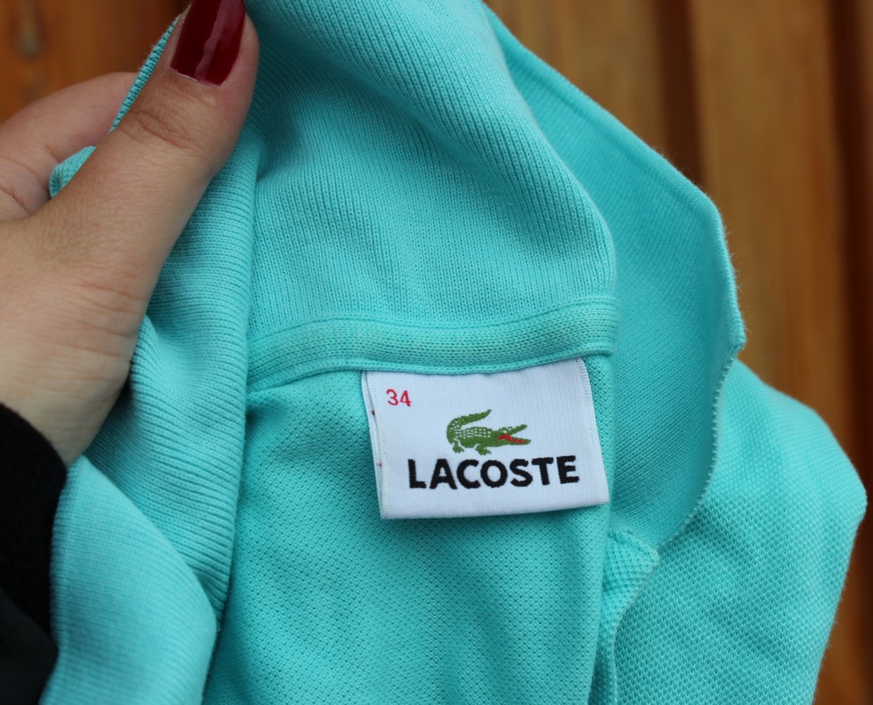 türkises Poloshirt von Lacoste, Größe 34