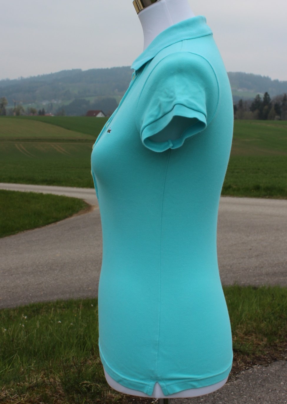 türkises Poloshirt von Lacoste, Größe 34