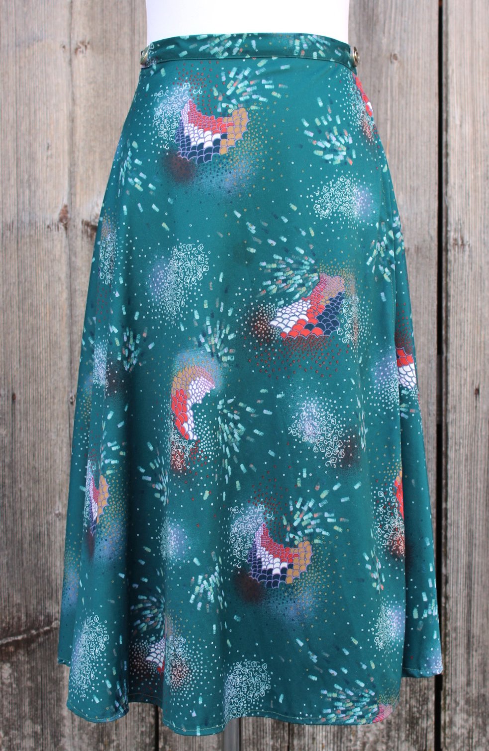 True Vintage Wickelrock in petrol-türkis mit abstraktem Muster, Einzelstück, ca. Größe 40