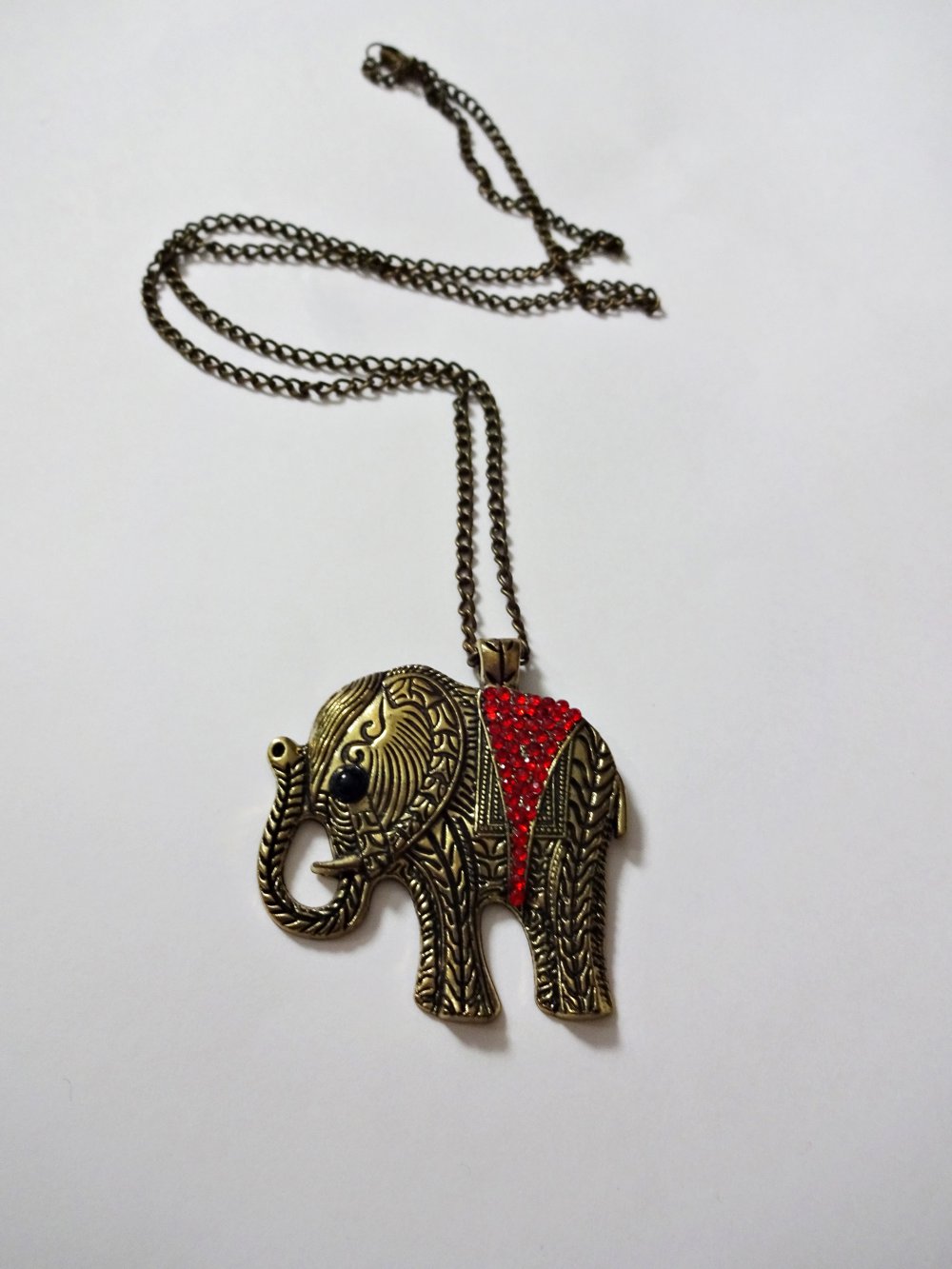 Lange Kette mit Elefantenanhänger und roten Glitzersteinen Altgold