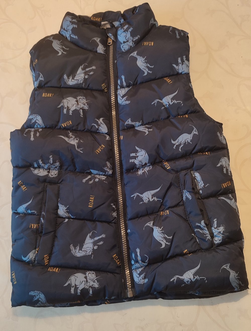 Steppweste mit Dinosauriern