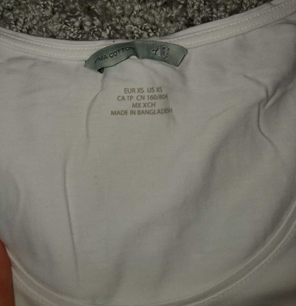 Dünnes weißes Oberteil mit 3/4-Arm in XS