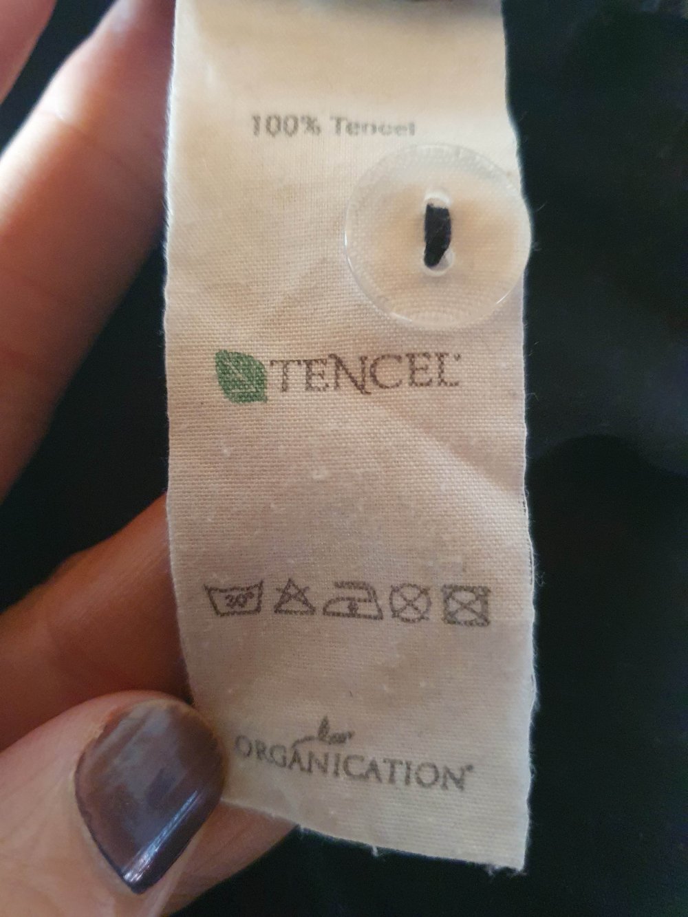 Organication Hose Chino schwarz Muster Blätter Zweige Wald L 40 Fair Öko