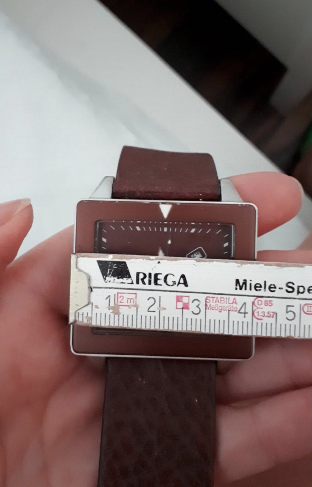 Braune Uhr von Storm. Original