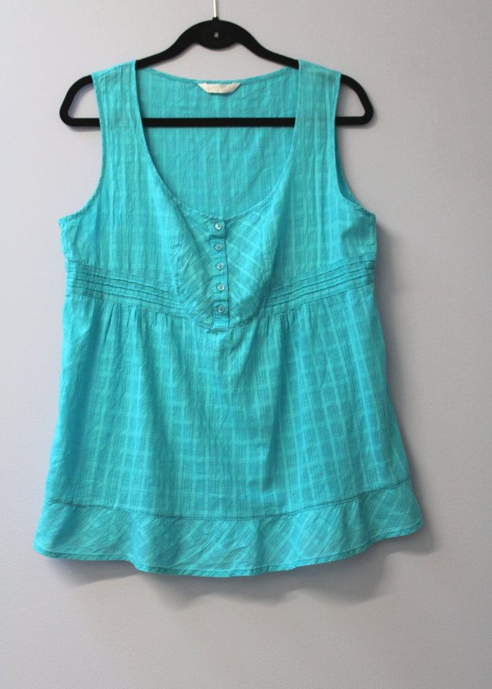 Schönes weibliches Top. Vermutlich Größe L.