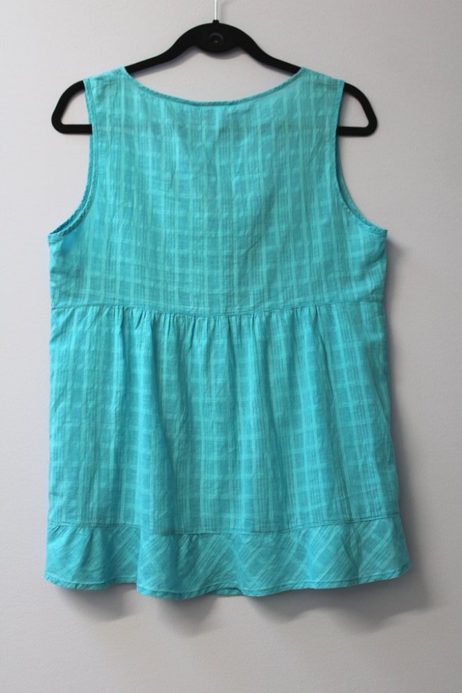 Schönes weibliches Top. Vermutlich Größe L.