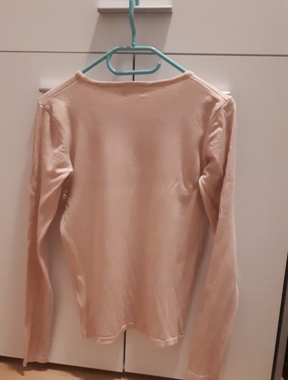 Rosafarbenes Langarmshirt