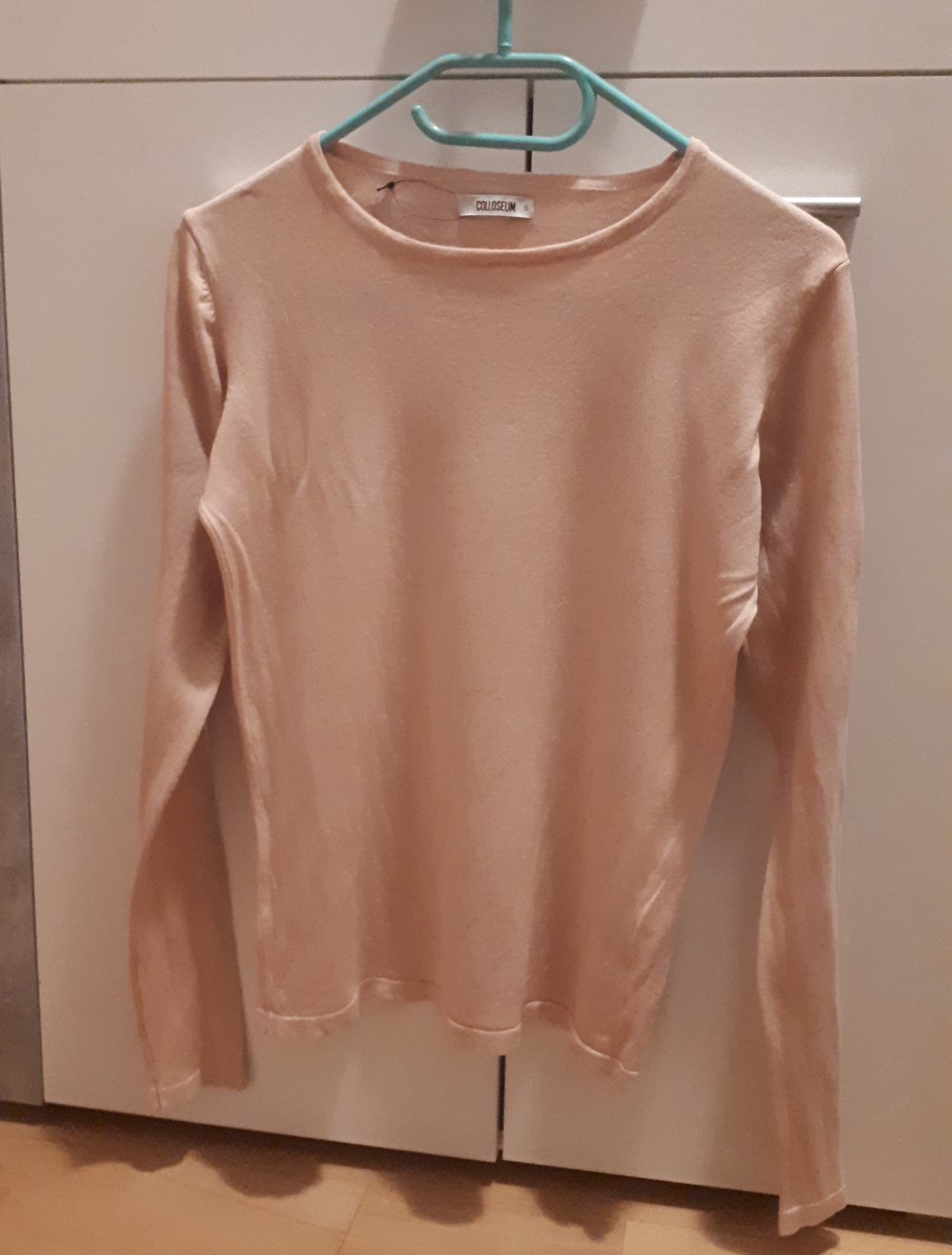 Rosafarbenes Langarmshirt