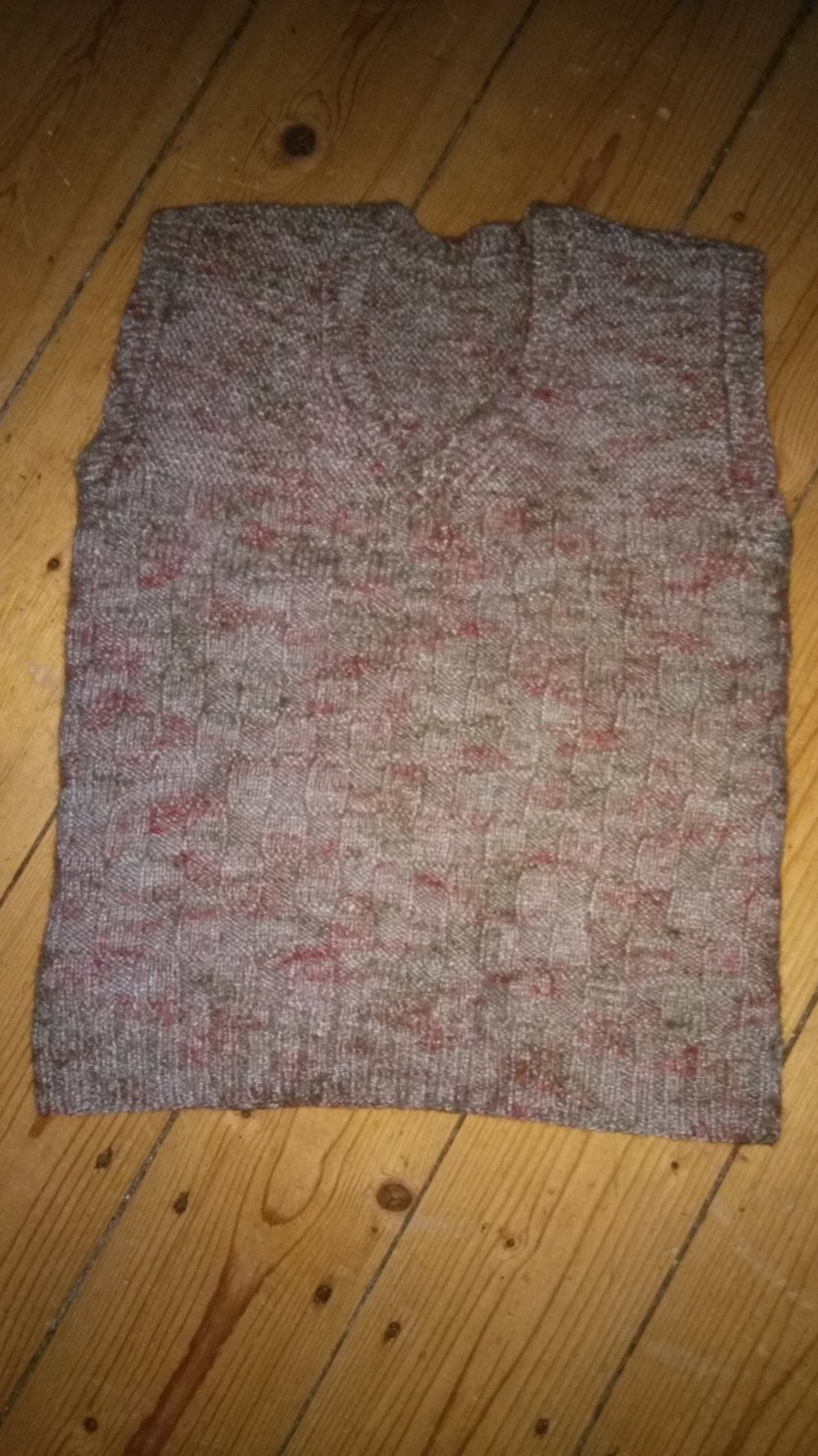 Pollunder grau-beige-rot gemustert