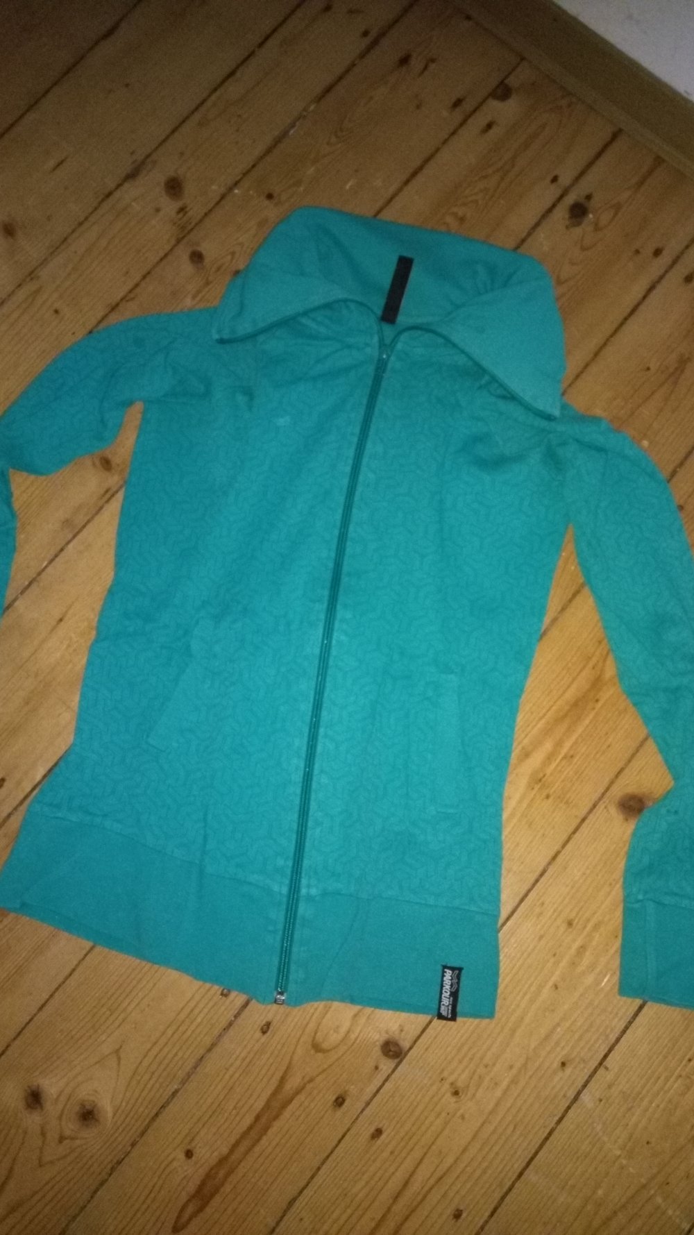 Türkise Weste mit Kragen