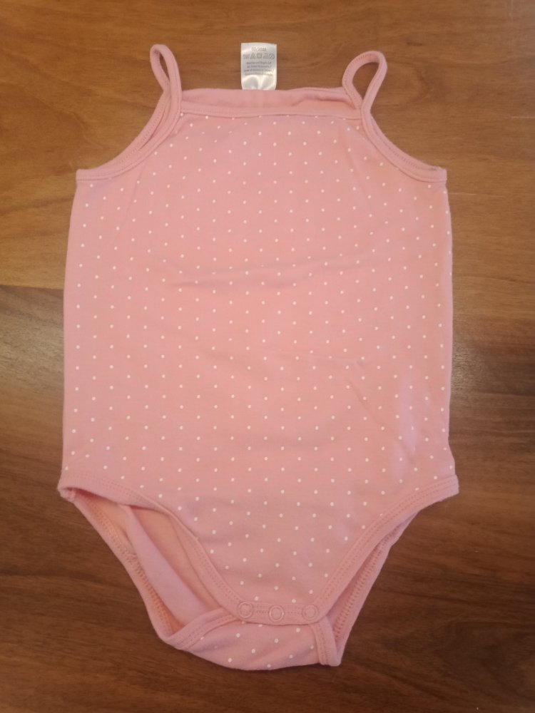 rosa Trägerbody mit weissen Punkten