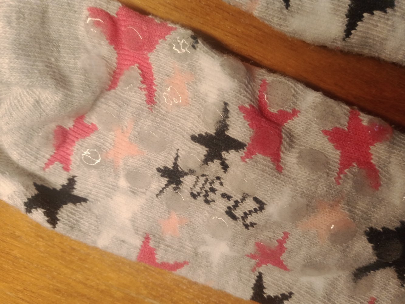 Sockenfinken grau mit Sternchen