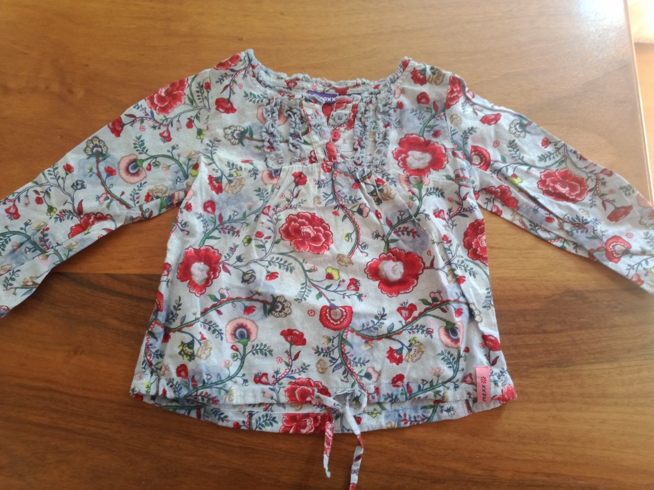 Bluse hellblau mit Blumen