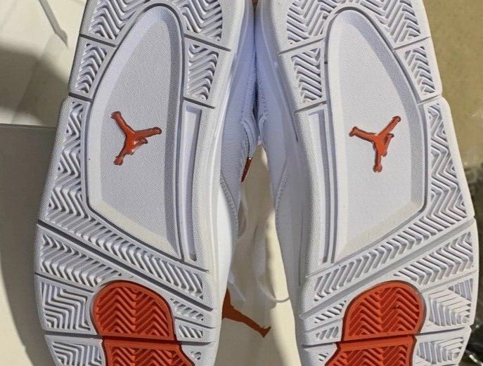 Air Jordan 4 Retro red metallic