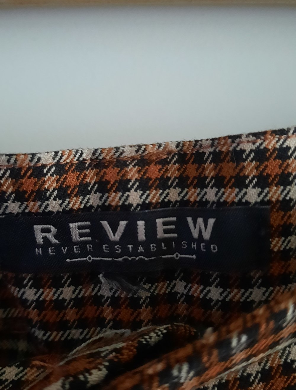 Hose braun schwarz weiss kariert von Review