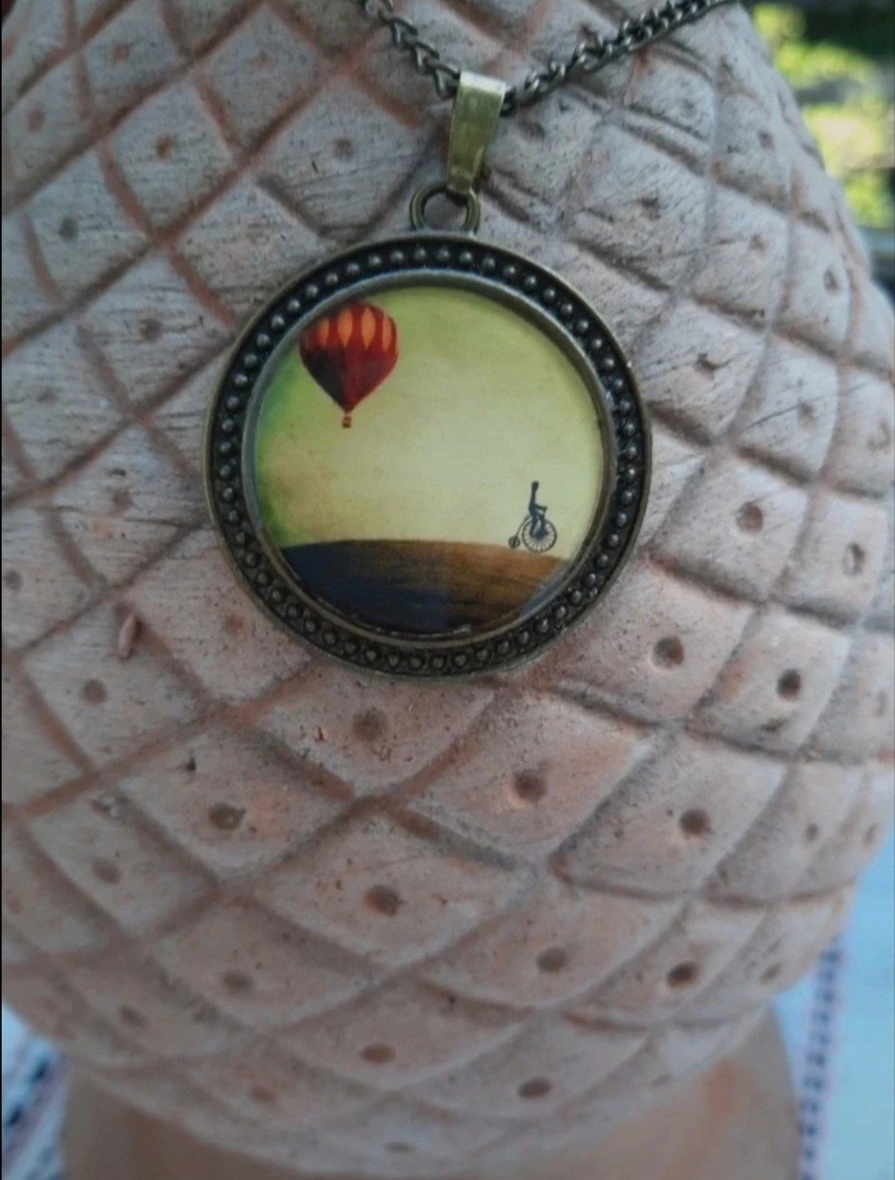 Kette mit Ballon und Fahrradfahrer Anhänger