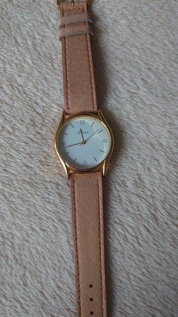 Armbanduhr beige gold weiß Leder defekt