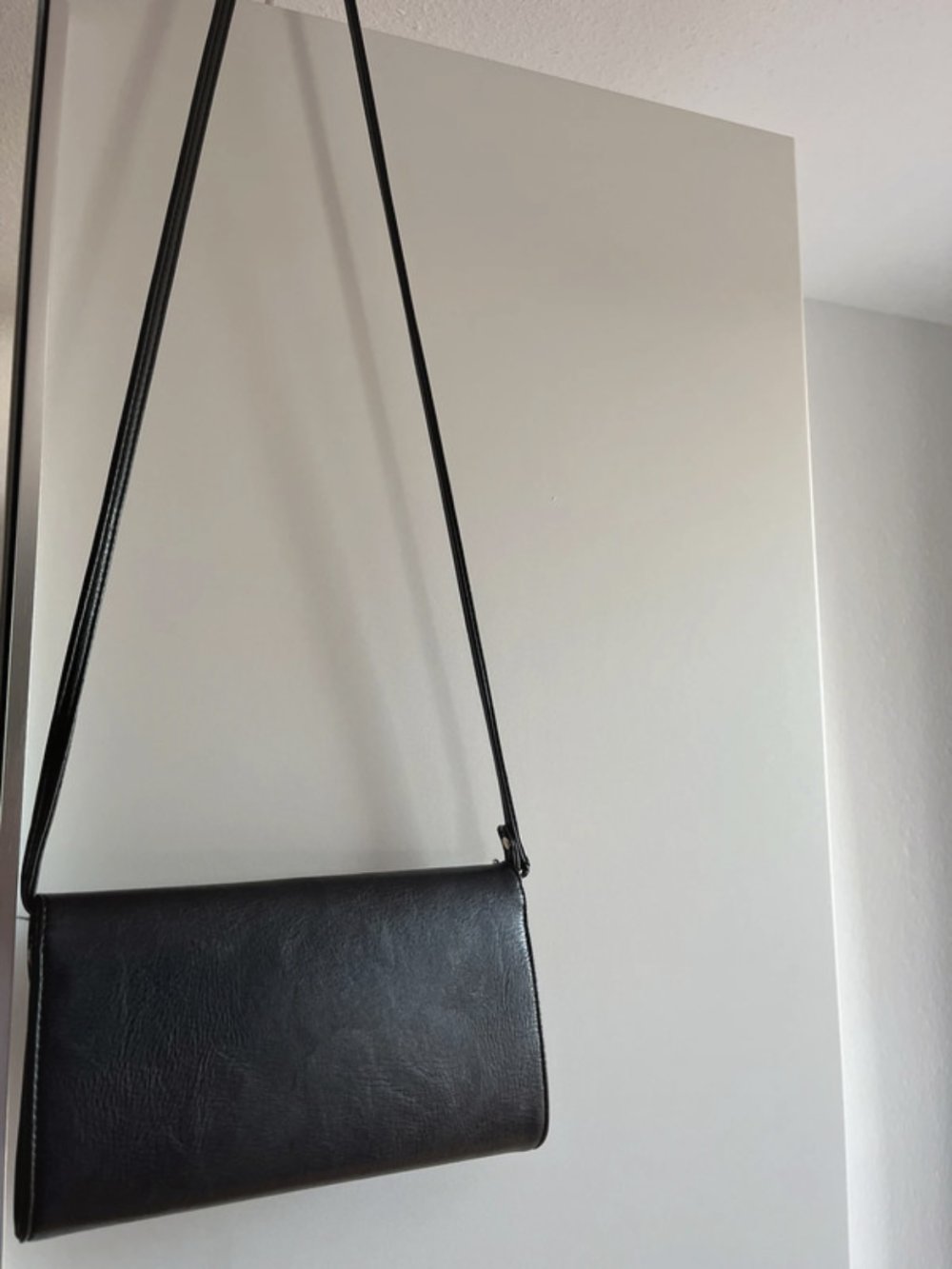 Schwarze Umhängetasche