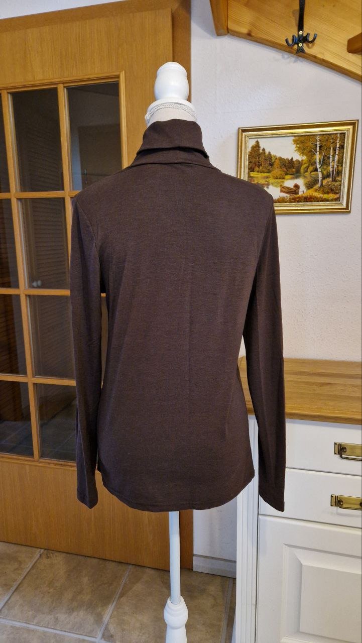Wie neu. Schöner Rollkragenpullover mit Pailletten.  Große M.